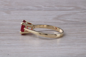 Two carat Oval cut Ruby set Yellow Gold Solitaire