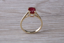 Load image into Gallery viewer, Two carat Oval cut Ruby set Yellow Gold Solitaire