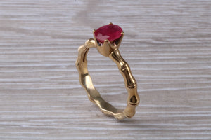 One carat Oval cut Ruby set Tree Branch Solitaire