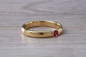 Tension set Natural Ruby Gold Band