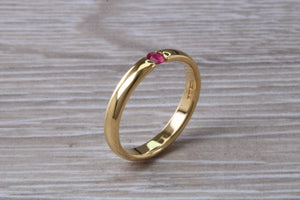 Tension set Natural Ruby Gold Band