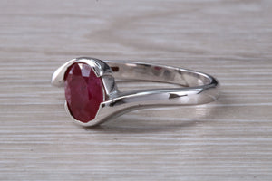 Oval cut Ruby set Crossover Ring