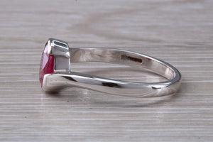 Oval cut Ruby set Crossover Ring