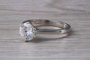 Forever One diamond solitaire, One carat Charles and Colvard diamond set in six claw ring and made in your choice of precious metal
