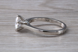 Forever One diamond solitaire, One carat Charles and Colvard diamond set in six claw ring and made in your choice of precious metal