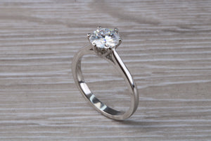 Forever One diamond solitaire, One carat Charles and Colvard diamond set in six claw ring and made in your choice of precious metal