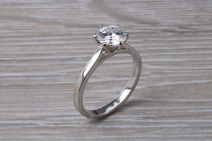 Forever One diamond solitaire, One carat Charles and Colvard diamond set in six claw ring and made in your choice of precious metal