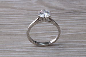 Forever One diamond solitaire, One carat Charles and Colvard diamond set in six claw ring and made in your choice of precious metal