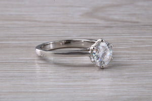 Forever One diamond solitaire, One carat Charles and Colvard diamond set in six claw ring and made in your choice of precious metal