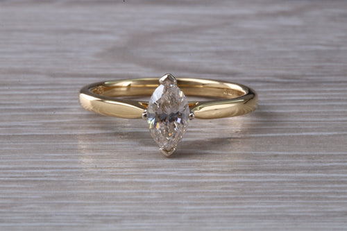 Half carat Marquise cut Certified Diamond set Gold Solitaire