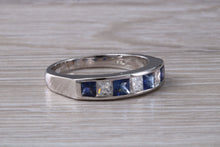 Load image into Gallery viewer, Traditional Blue Sapphire and Diamond set Eternity Ring