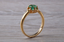 Load image into Gallery viewer, Half carat Emerald set Yellow Gold Solitaire