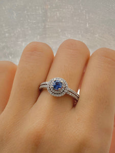 Blue Sapphire and Double Halo set Diamond Ring