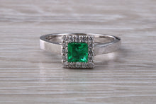 Load image into Gallery viewer, Emerald and Diamond Halo set Platinum Ring
