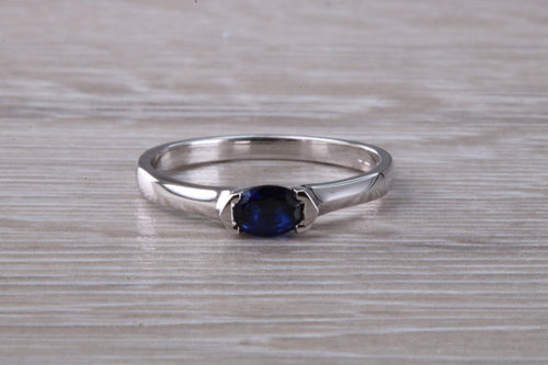 Half carat Oval cut Blue Sapphire set 18ct White Gold Ring