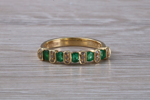 Emerald and Diamond eternity ring, bar set Emeralds with Diamonds yellow gold