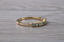 Load image into Gallery viewer, 7 stone Alexandrite eternity ring, 9ct yellow gold, suitable for all age groups