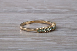 7 stone Alexandrite eternity ring, 9ct yellow gold, suitable for all age groups