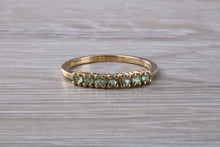 Load image into Gallery viewer, 7 stone Alexandrite eternity ring, 9ct yellow gold, suitable for all age groups