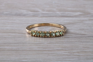 7 stone Alexandrite eternity ring, 9ct yellow gold, suitable for all age groups