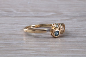 Multi gemstone set ring, 9ct yellow gold and set with bluse sapphire, green sapphire and yellow sapphireand diamonds