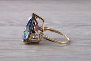 Large 13 carats Mystic Blue Topaz and Diamond set Yellow Gold Ring