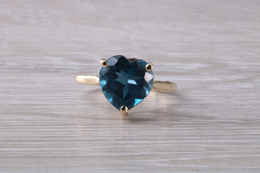 Heart shape London blue Topaz ring made from solid 9ct yellow gold with British hallmark, ideal dress or statement ring