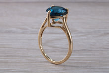 Load image into Gallery viewer, Heart shape London blue Topaz ring made from solid 9ct yellow gold with British hallmark, ideal dress or statement ring