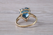 Load image into Gallery viewer, Heart shape London blue Topaz ring made from solid 9ct yellow gold with British hallmark, ideal dress or statement ring