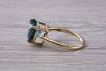Load image into Gallery viewer, Heart shape London blue Topaz ring made from solid 9ct yellow gold with British hallmark, ideal dress or statement ring
