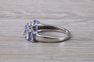 7 stone natural Tanzanite eternity ring, oval cut Tanzanite set in 9ct white gold, one and half carats Tanzanite