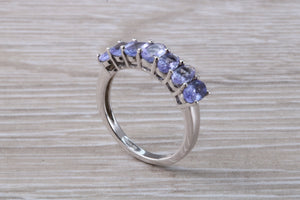 7 stone natural Tanzanite eternity ring, oval cut Tanzanite set in 9ct white gold, one and half carats Tanzanite