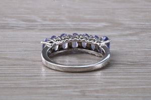 7 stone natural Tanzanite eternity ring, oval cut Tanzanite set in 9ct white gold, one and half carats Tanzanite