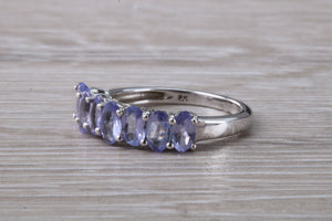 7 stone natural Tanzanite eternity ring, oval cut Tanzanite set in 9ct white gold, one and half carats Tanzanite