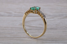 Load image into Gallery viewer, Dainty Oval cut Emerald and Diamond set Yellow Gold Ring