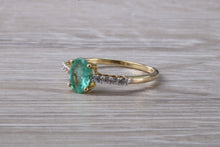 Load image into Gallery viewer, Dainty Oval cut Emerald and Diamond set Yellow Gold Ring