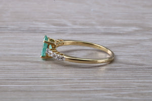 Dainty Oval cut Emerald and Diamond set Yellow Gold Ring
