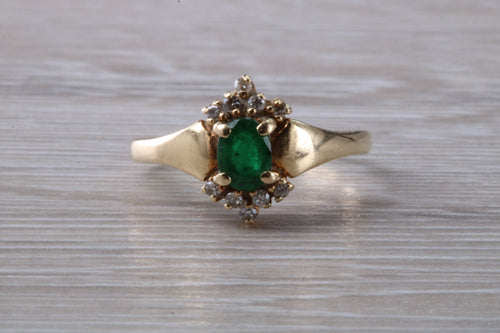 Emerald and Diamond set Yellow Gold Ring