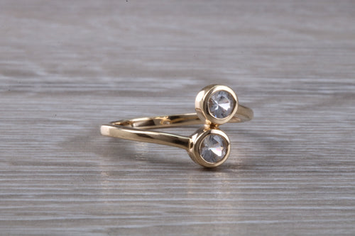 White Sapphire set Yellow Gold Crossover Ring