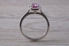 Load image into Gallery viewer, One carat Pink Sapphire and Diamond Halo set Ring