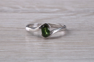 Oval cut Green Sapphire Crossover Ring