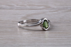 Oval cut Green Sapphire Crossover Ring