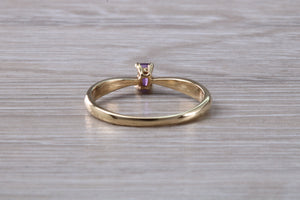 Simple and Dainty Amethyst set Yellow Gold Solitaire