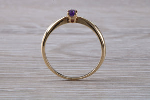 Simple and Dainty Amethyst set Yellow Gold Solitaire