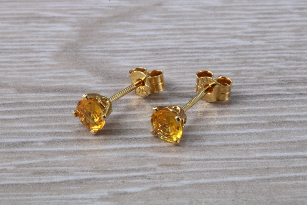 Round cut Yellow Sapphire set Gold Stud Earrings