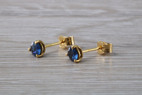 Blue Sapphire set Yellow Gold Stud Earrings