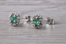 Load image into Gallery viewer, Emerald and Diamond Halo set 18ct White Gold Stud Earrings