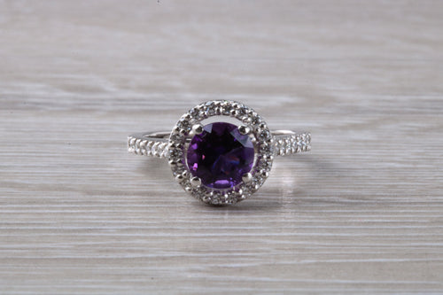 Beautiful Amethyst and Diamond halo set ring, 1.50 carat Gemstones complimented in 950 grade Platinum, just simply stunning