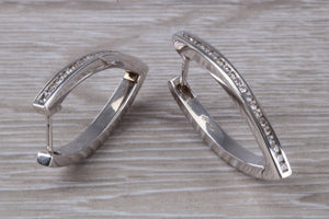 Very long Diamond set half hoop earrings. 18ct Gold with Latchback fittings, very very dressy earrings with top F VS1 grade Diamonds
