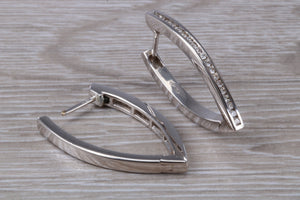 Very long Diamond set half hoop earrings. 18ct Gold with Latchback fittings, very very dressy earrings with top F VS1 grade Diamonds